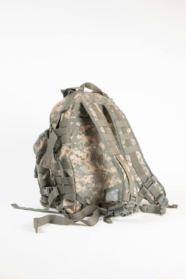 High-quality image of a camouflage military backpack on a white background, perfect for outdoor gear representation.